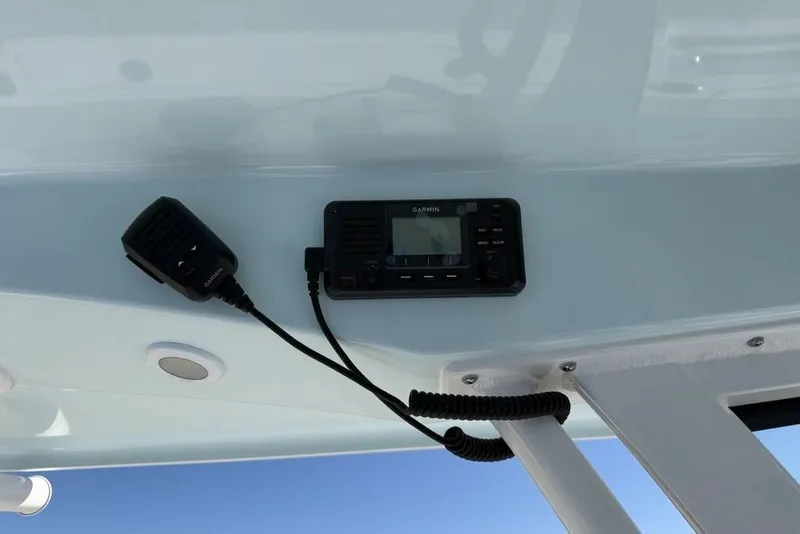 Slide: The Image of 2026 Sportsman Open 232 Center Console with Garmin marine radio installed. - 16