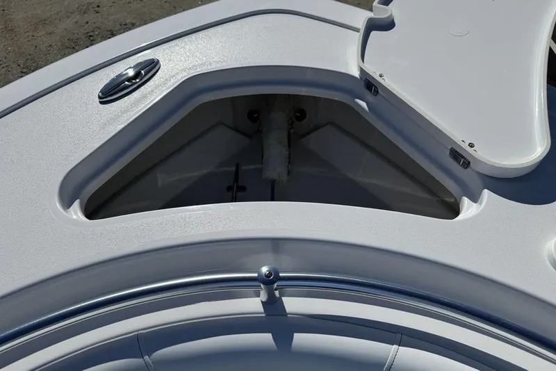Slide: The Image of Open storage compartment on 2026 Sportsman Open 232 Center Console boat. - 20
