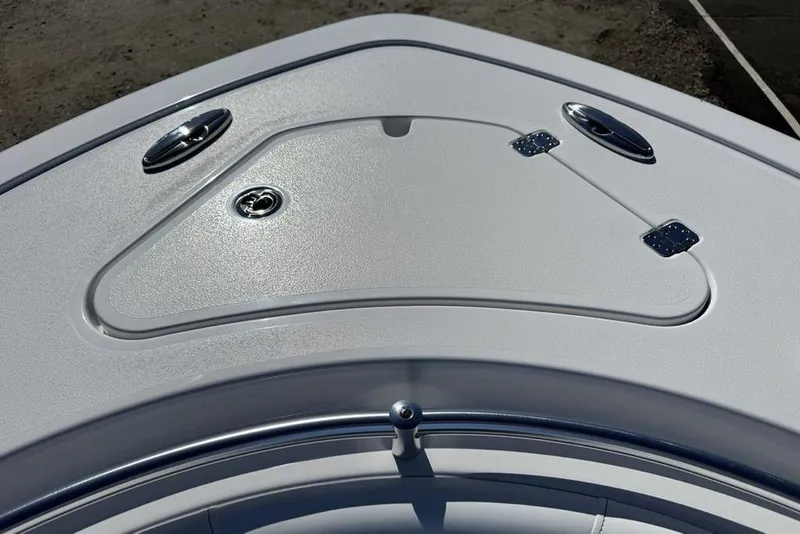 Slide: The Image of 2026 Sportsman Open 232 Center Console boat deck with storage compartment. - 23