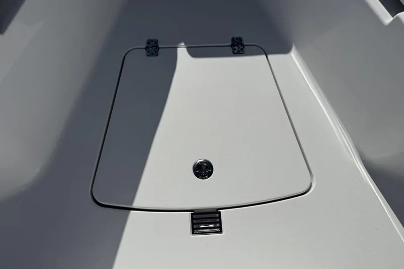 Slide: The Image of 2026 Sportsman Open 232 Center Console boat storage compartment detail. - 5