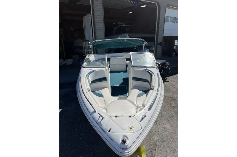 Slide: The Image of Mercury MerCruiser 5.0L engine cover with specifications, Larson SEI226 2000 model. - 5