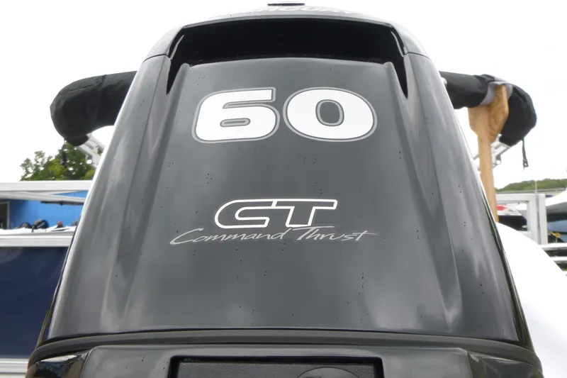 Slide: The Image of Outboard motor with "60 CT Command Thrust" on a 2026 Sun Tracker Bass Buggy 18 DLX. - 13