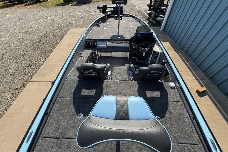 Slide: The Image of 2026 Phoenix 20 XE boat interior with dual seats and modern dashboard. - 18