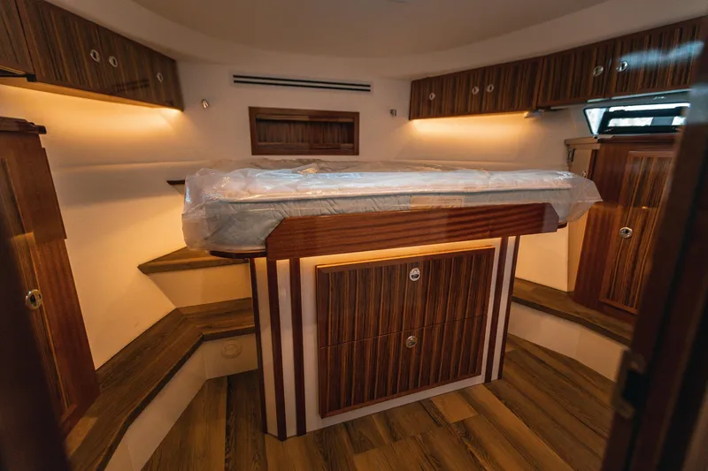 Slide: The Image of Luxurious interior of 2025 Lindell 48' yacht with elegant wood finish. - 17