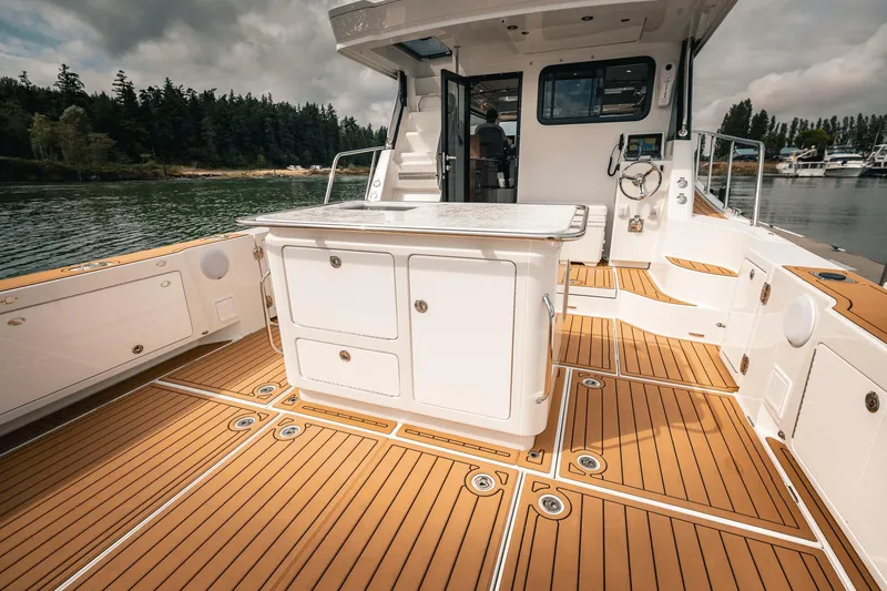 Slide: The Image of Luxurious 2025 Lindell 48' yacht deck with sleek design and modern amenities. - 3