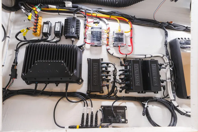 Slide: The Image of Electrical system setup in a 2025 Lindell 48' boat featuring Garmin equipment. - 38