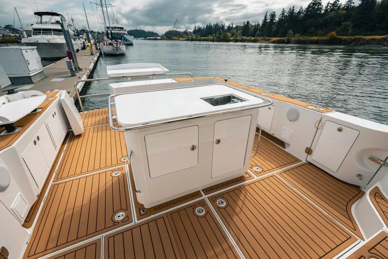 Slide: The Image of Luxurious 2025 Lindell 48' yacht deck with sleek design and modern amenities. - 4