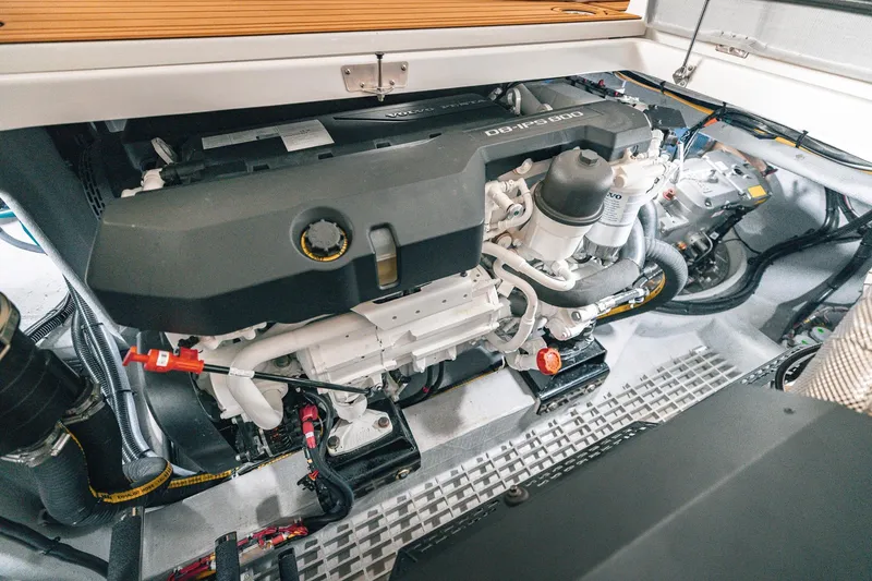 Slide: The Image of Engine compartment of a 2025 Lindell 48' boat, featuring a Volvo Penta D8/IPS 800 engine. - 42