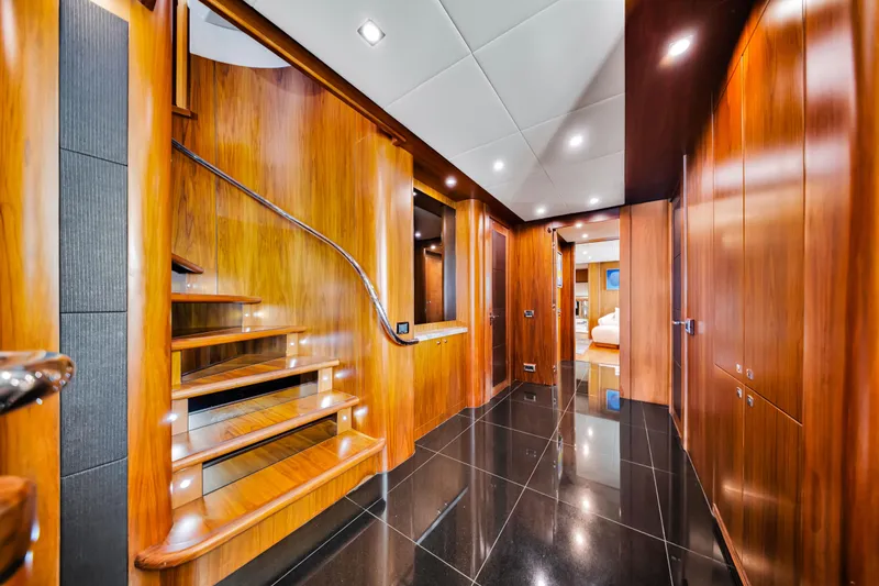 Slide: The Image of Luxurious wooden interior of 2009 Sunseeker 37 Metre Yacht with elegant staircase and glossy flooring. - 13