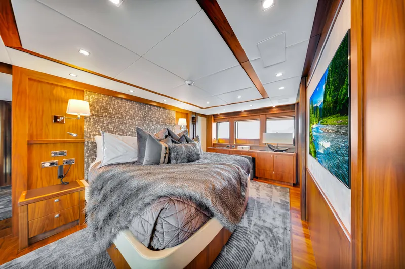 Slide: The Image of Luxurious bedroom interior of 2009 Sunseeker 37 Metre Yacht with elegant wood finishes. - 15