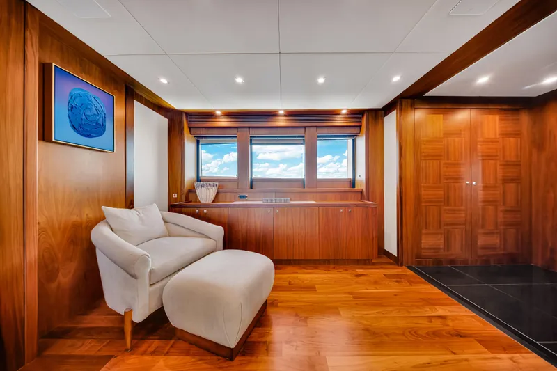 Slide: The Image of Luxurious interior of 2009 Sunseeker 37 Metre Yacht with elegant wood paneling and plush seating. - 16