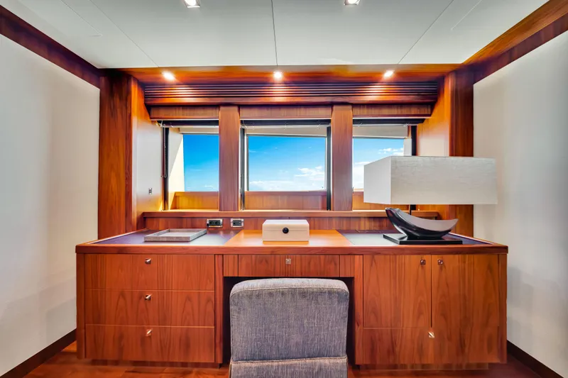 Slide: The Image of Luxurious wooden desk area on 2009 Sunseeker 37 Metre Yacht with ocean view. - 17