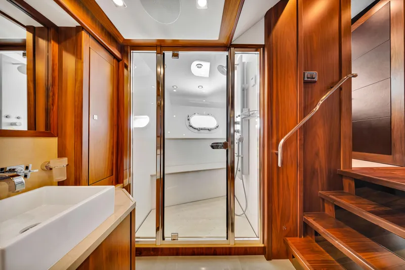 Slide: The Image of Luxurious bathroom on 2009 Sunseeker 37 Metre Yacht with wooden accents and modern fixtures. - 20