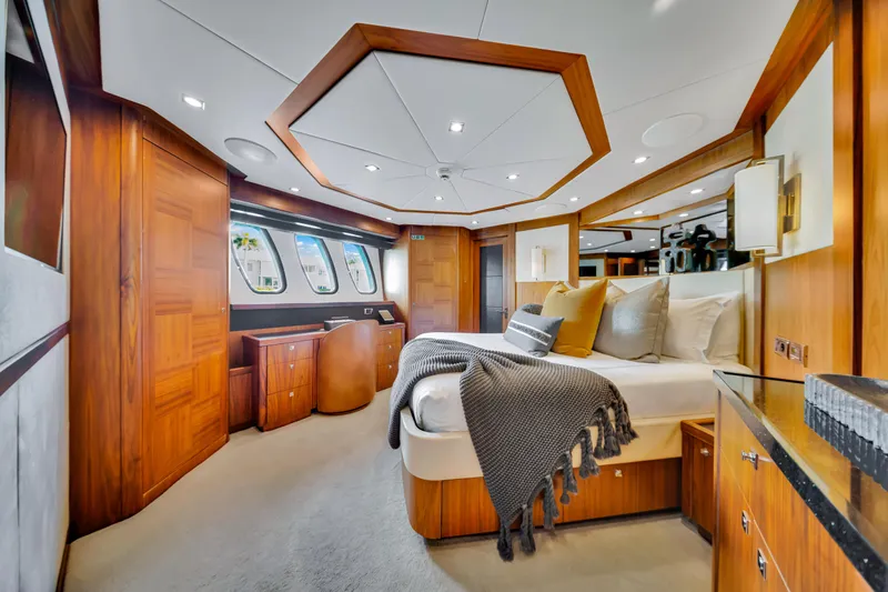 Slide: The Image of Luxurious bedroom interior of 2009 Sunseeker 37 Metre Yacht with elegant wood finishes. - 22