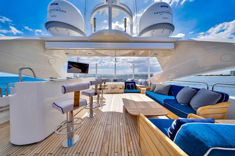 Slide: The Image of Luxurious Sunseeker 37 Metre Yacht 2009 with elegant outdoor seating and ocean view. - 38