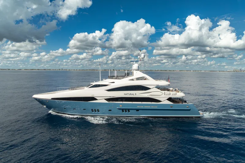 Slide: The Image of Luxurious 2009 Sunseeker 37 Metre Yacht cruising under a vibrant blue sky. - 49