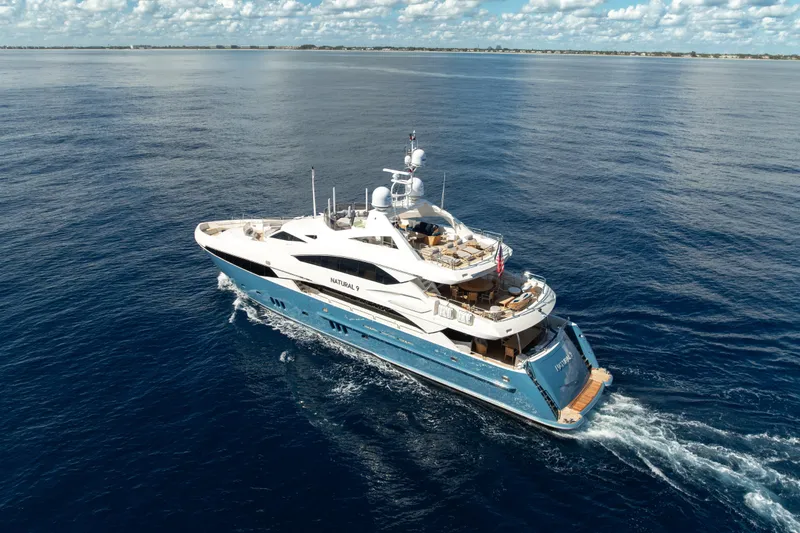 Slide: The Image of Luxurious 2009 Sunseeker 37 Metre Yacht cruising on open sea under blue sky. - 50