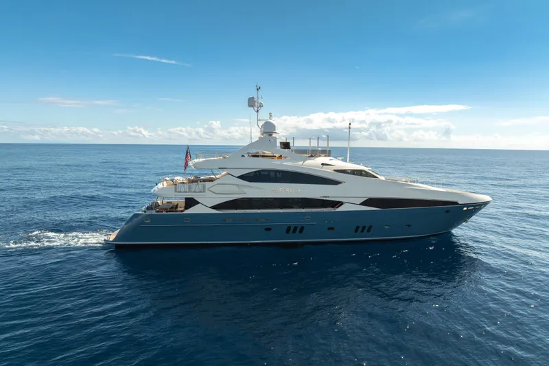 The Image of Luxurious 2009 Sunseeker 37 Metre Yacht cruising on open sea under clear blue sky. - 6