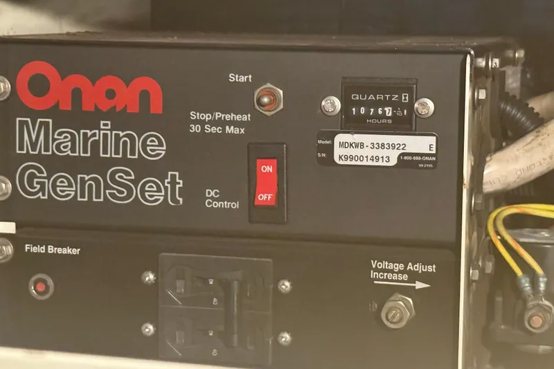 Slide: The Image of Onan Marine GenSet control panel on 1980 Hatteras 42 LRC boat. - 32