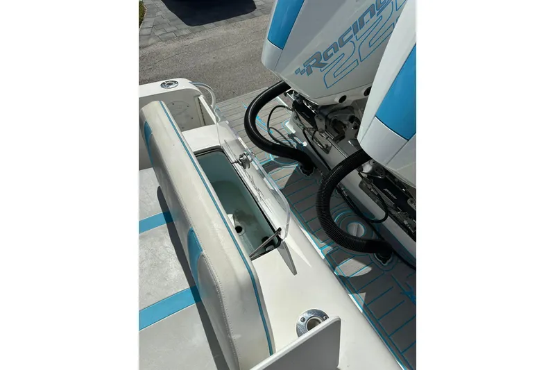 Slide: The Image of 2019 Concept 27' CC boat interior with dual engines and seating. - 11