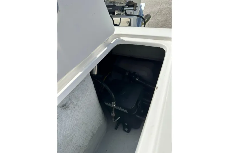 Slide: The Image of Open compartment of 2019 Concept 27' CC boat showing interior components. - 12