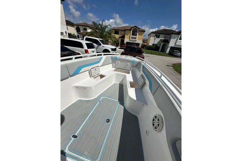 Slide: The Image of 2019 Concept 27' CC boat interior with modern seating and sleek design. - 20