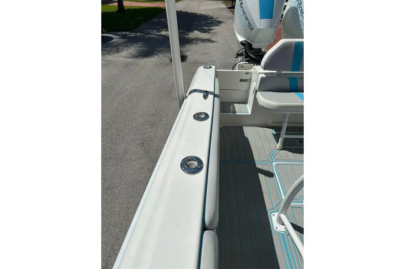 Slide: The Image of 2019 Concept 27' CC boat interior with seating and rod holders. - 30