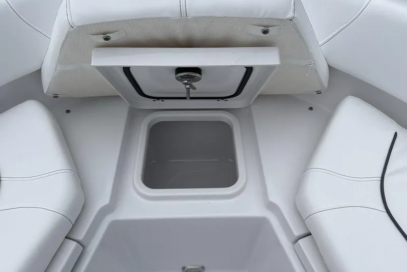 Slide: The Image of 2026 Sportsman Heritage 231 Center Console boat interior storage compartment. - 12