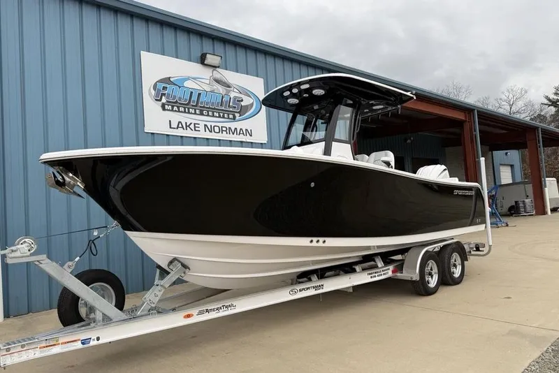 Slide: The Image of 2026 Sportsman Heritage 231 Center Console boat on trailer at Foothills Marine Center. - 3