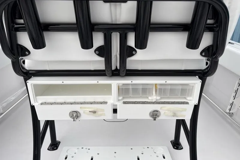 Slide: The Image of 2026 Sportsman Heritage 231 Center Console storage compartments and seating detail. - 34