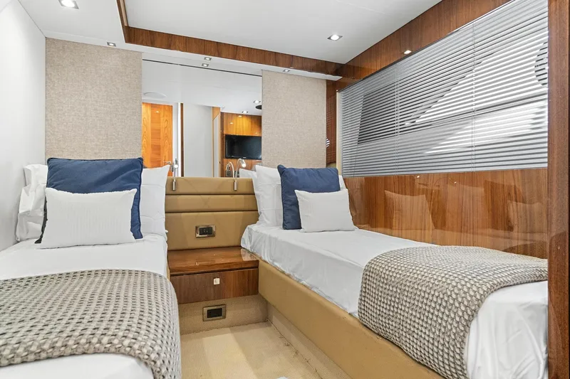 Slide: The Image of Luxurious twin cabin interior of 2019 Sunseeker Manhattan 66 yacht. - 25