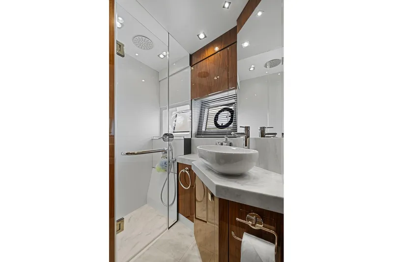 Slide: The Image of Luxurious bathroom in 2019 Sunseeker Manhattan 66 yacht with modern fixtures and elegant design. - 27