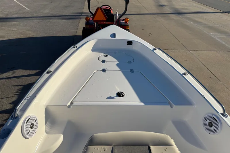 Slide: The Image of 2026 Key West 1720 Center Console boat on trailer, viewed from the bow. - 18