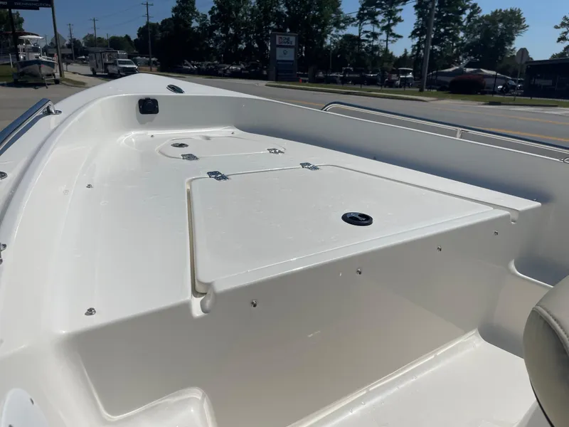 Slide: The Image of 2026 Key West 1720 Center Console boat on trailer, parked outdoors. - 3