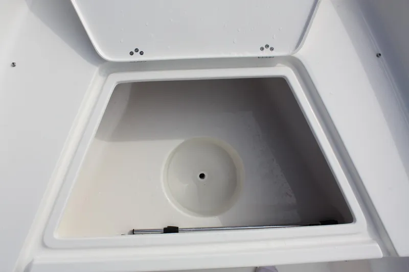 Slide: The Image of 2026 Key West 1720 Center Console boat displayed outdoors, showcasing sleek design and seating. - 4