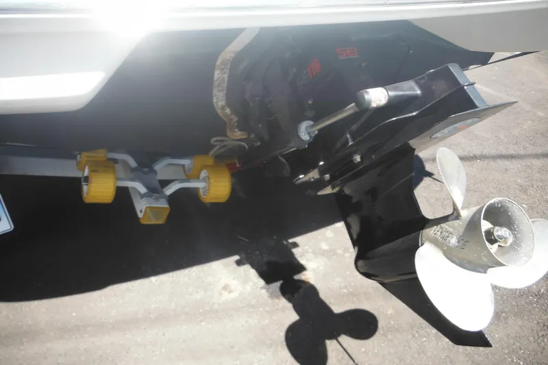 Slide: The Image of 2011 Sea Ray 205 Sport boat propeller and trailer detail. - 17