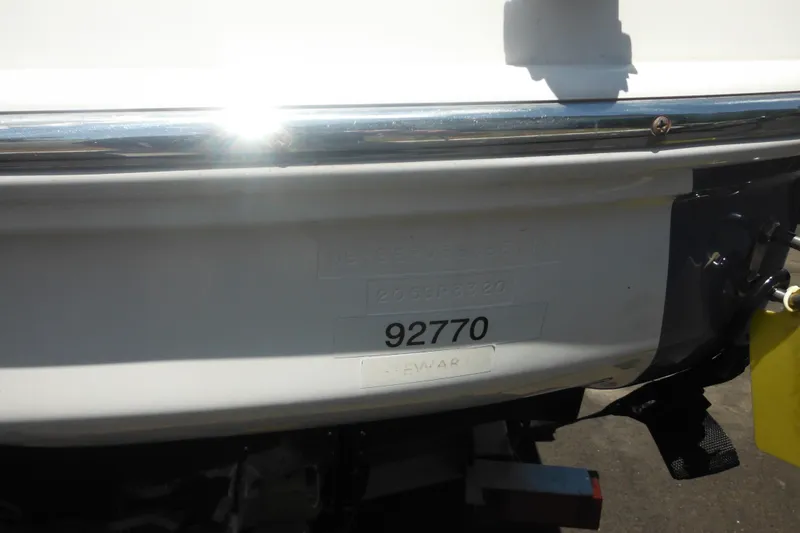 Slide: The Image of Rear view of a 2011 Sea Ray 205 Sport boat with identification number. - 18