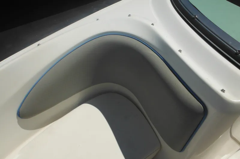 Slide: The Image of Interior seating of 2011 Sea Ray 205 Sport boat, featuring sleek design and comfortable upholstery. - 25