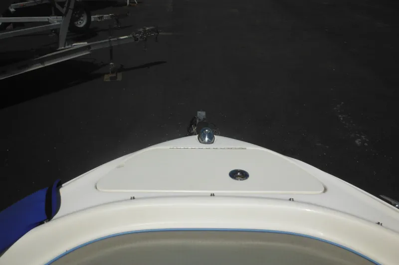 Slide: The Image of Bow view of 2011 Sea Ray 205 Sport boat on trailer. - 26