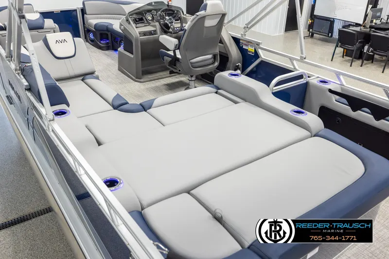 Slide: The Image of 2026 Avalon LSZ VRB pontoon boat interior with luxurious seating and modern dashboard. - 11