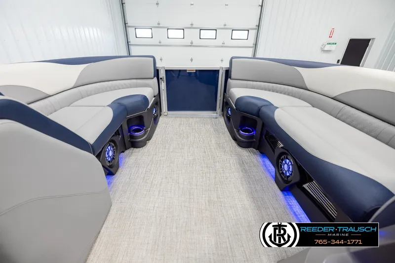 Slide: The Image of Luxurious interior of 2026 Avalon LSZ VRB pontoon boat with LED lighting and plush seating. - 18