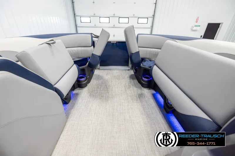 Slide: The Image of Interior of 2026 Avalon LSZ VRB boat with modern seating and blue LED lighting. - 19