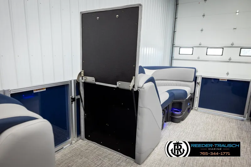 Slide: The Image of Interior of 2026 Avalon LSZ VRB pontoon boat with plush seating and modern design. - 21