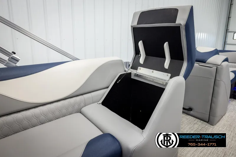 Slide: The Image of 2026 Avalon LSZ VRB boat interior with open storage compartment, featuring sleek, modern design. - 23