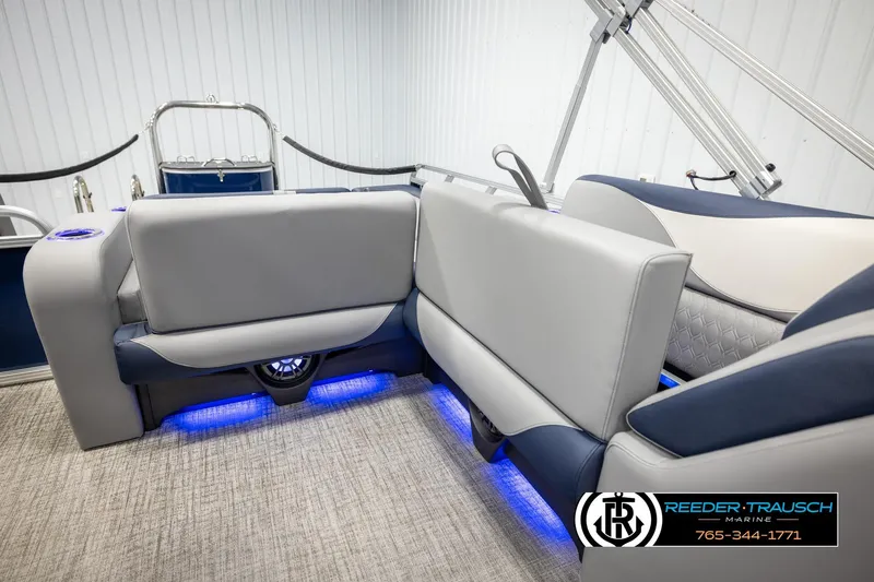 Slide: The Image of 2026 Avalon LSZ VRB boat interior with modern seating and blue LED lighting. - 25