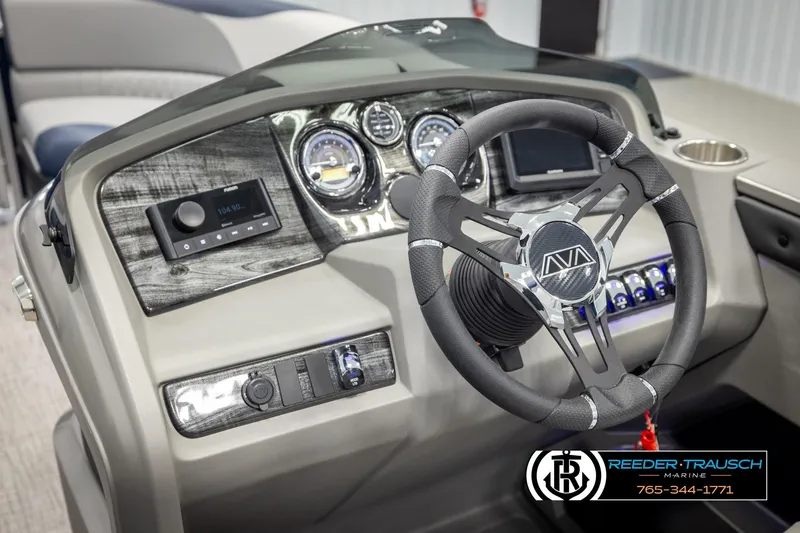 Slide: The Image of 2026 Avalon LSZ VRB boat dashboard with modern steering wheel and control panel. - 29