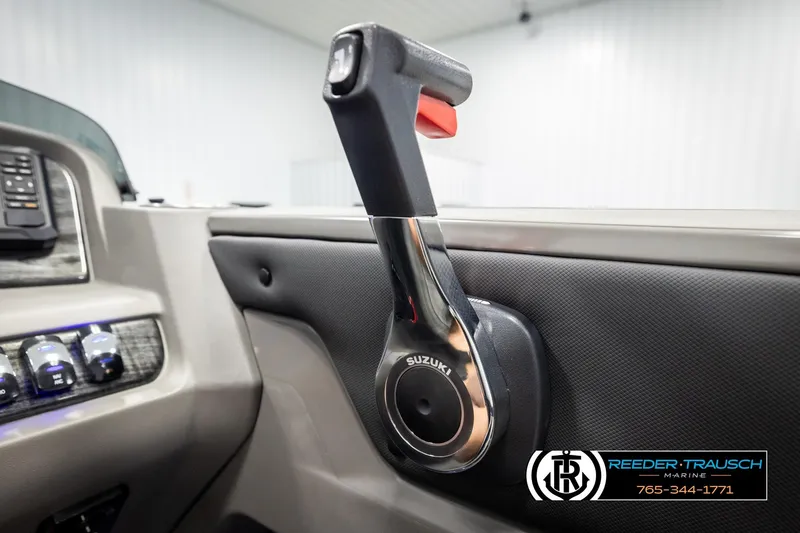 Slide: The Image of Close-up of 2026 Avalon LSZ VRB boat throttle control in a modern cockpit. - 36