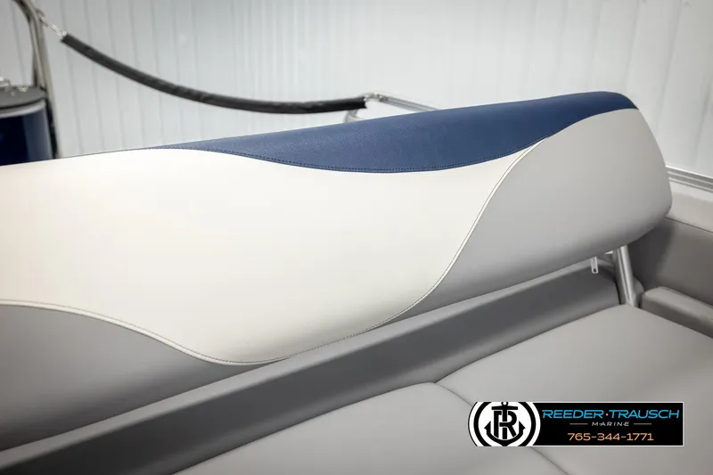 Slide: The Image of 2026 Avalon LSZ VRB boat seat with blue and white upholstery, Reeder-Trausch Marine logo. - 40