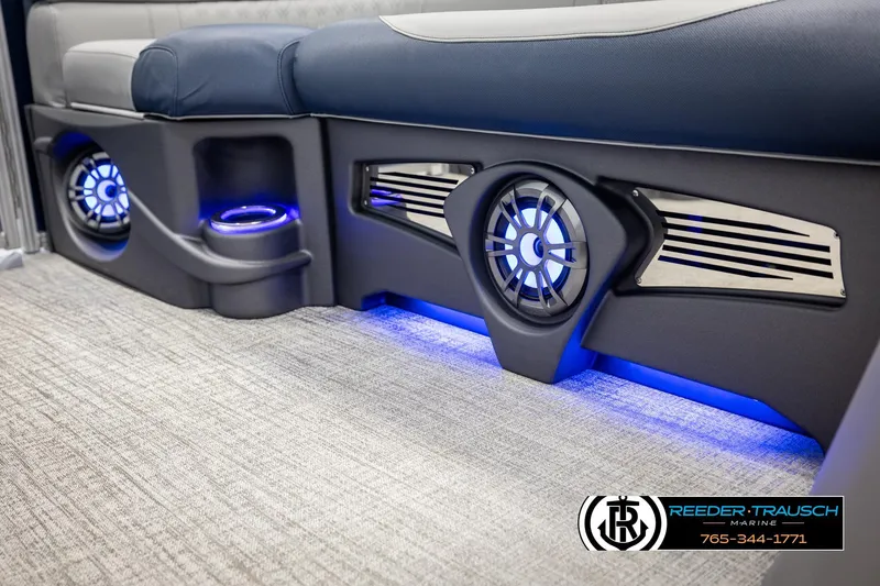 Slide: The Image of 2026 Avalon LSZ VRB boat interior with blue LED lighting and modern speaker system. - 41