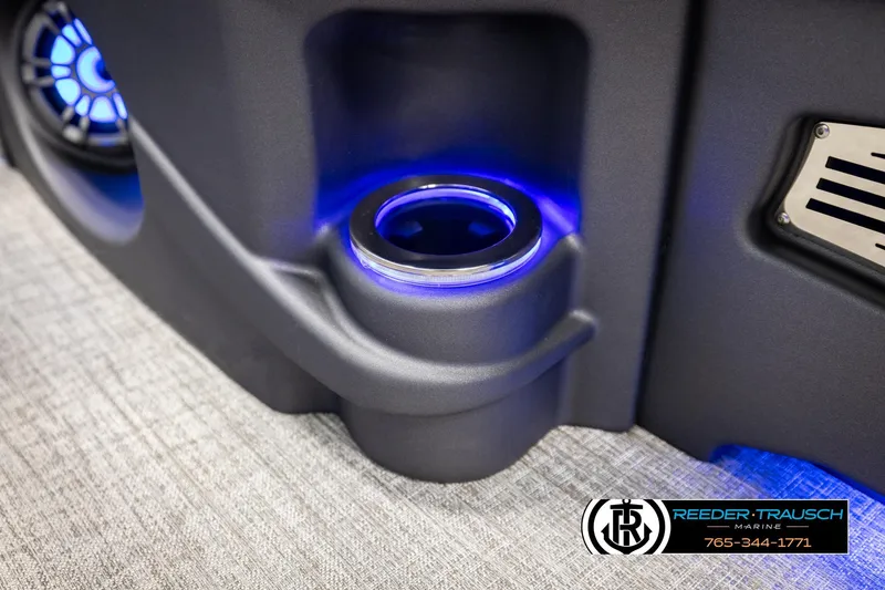 Slide: The Image of 2026 Avalon LSZ VRB boat interior with illuminated cup holder and speaker. - 42